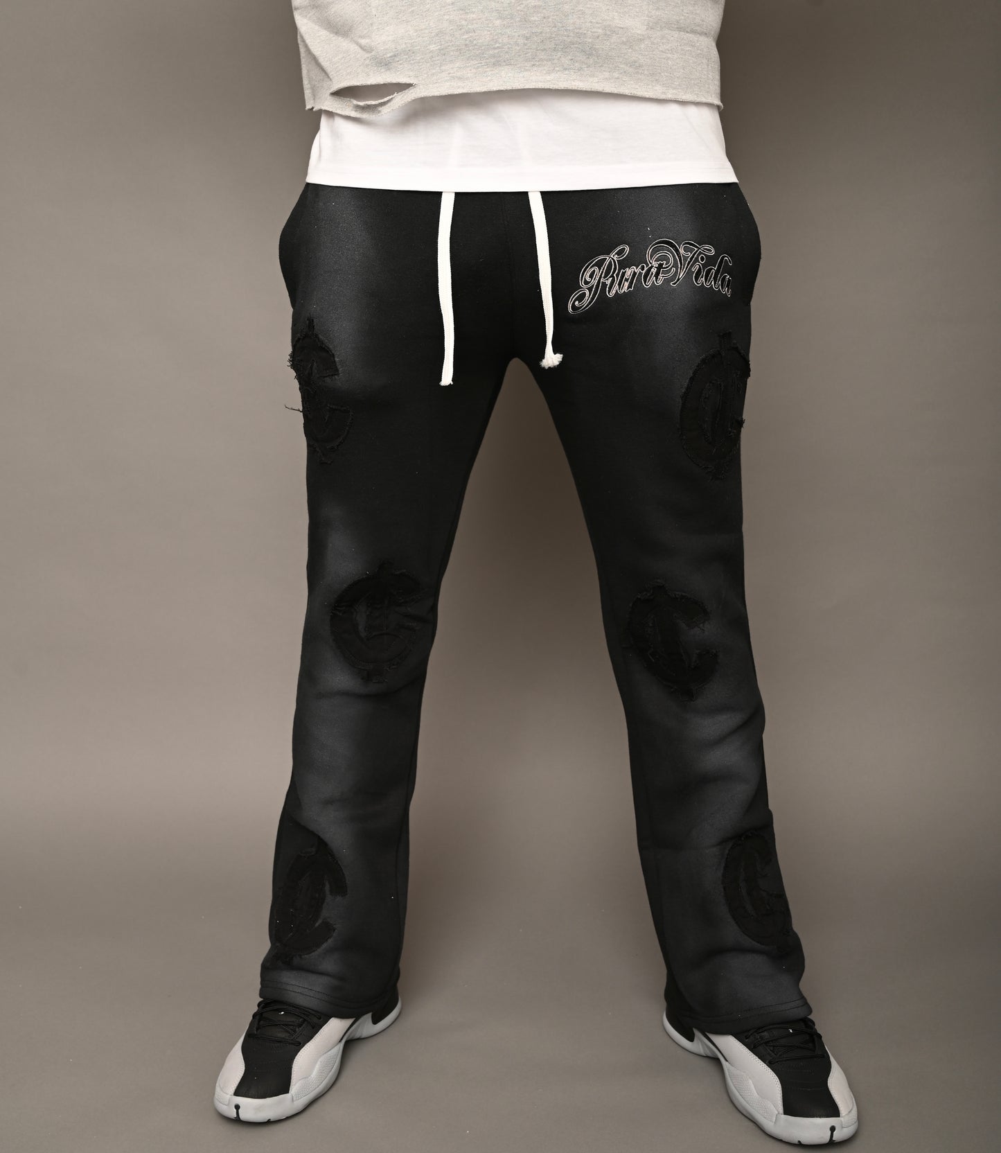 “Cent Logo Distressed Pants”